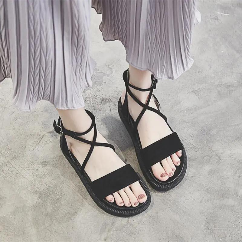 Summer Sandals Female Students Korean Version of The Wild Flat-bottomed Cross Straps Thick-soled Sponge Cake Soft-soled Roman Shoes