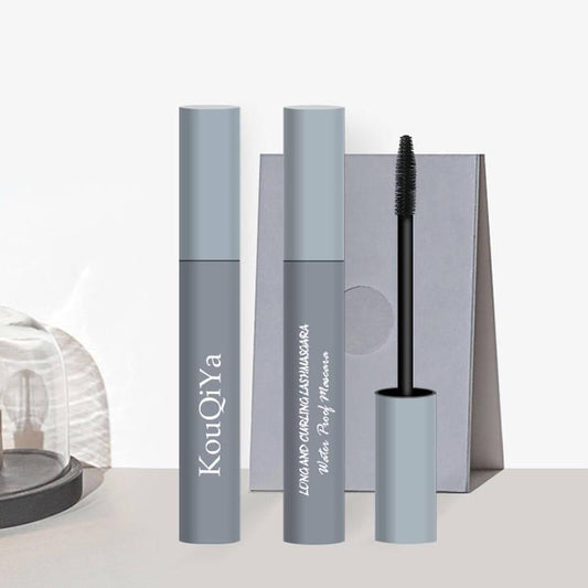 Cute black mascara women non-smooth stretch anti-sweat slender curl long dense Not to discolor