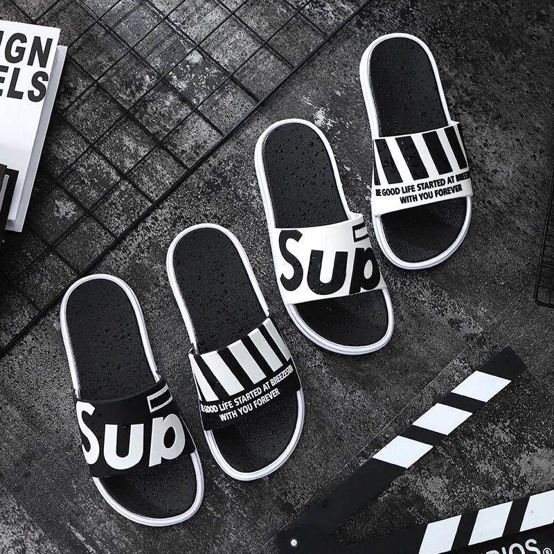 Sandals and slippers men and women fashion word drag couple outdoor wear black and white extra large