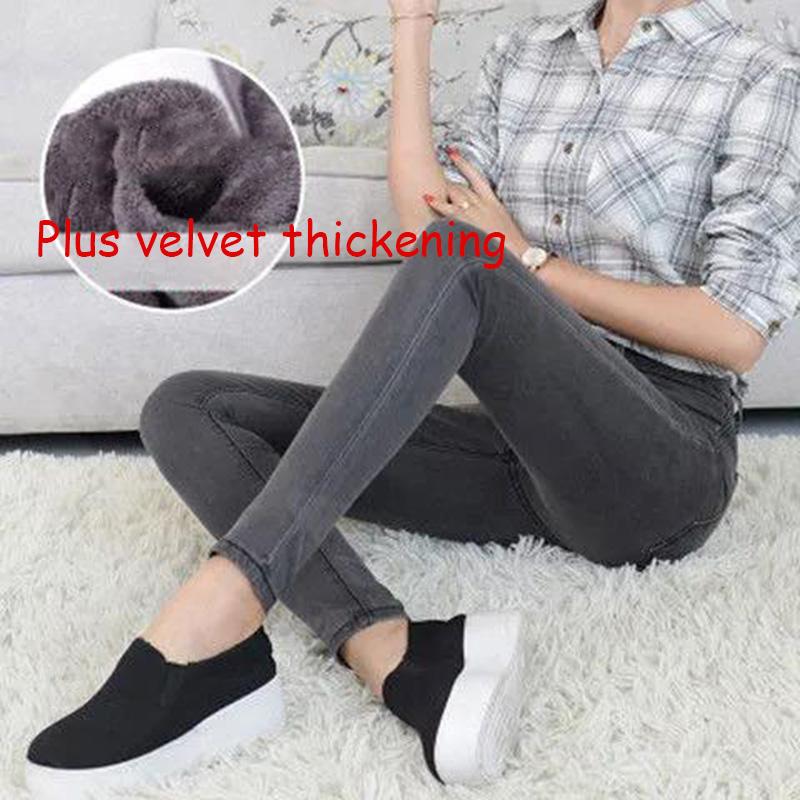Winter High-waisted Plus Velvet Thickened Jeans Women's Stretch Solid Color Plus Size Slimming Plus Cotton Warm Feet Trousers