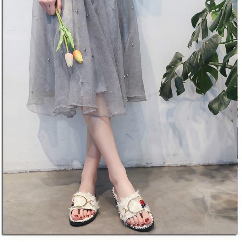 Summer sandals and slippers female Xia Ms. flat bottom hairy slippers wear fashion word drag female