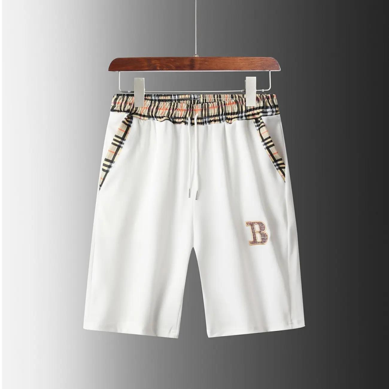 Sports Suit Men's Summer Trend Striped Plaid Stitching Summer Men's Casual Short-sleeved Five-point Pants Two-piece Set