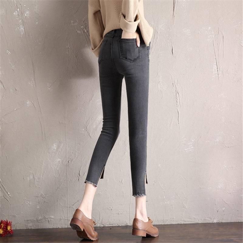 WTEMPO Thin and Irregular Jeans Feet Female Korean Version of The Slim Beggar Hole Nine Points Pencil Pants