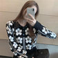 Autumn  Winter Design Sense Long-sleeved Wild Loose Jacquard Three-dimensional Flower Knitted Top Women