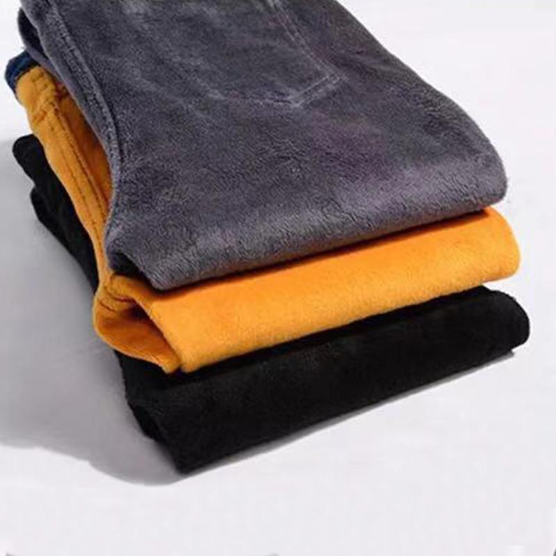 Winter High-waisted Plus Velvet Thickened Jeans Women's Stretch Solid Color Plus Size Slimming Plus Cotton Warm Feet Trousers