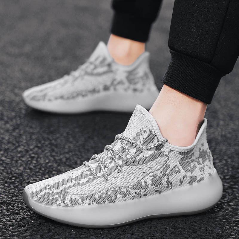 Summer breathable flat bottom leisure light and comfortable Knitted upper sneakers deodorant