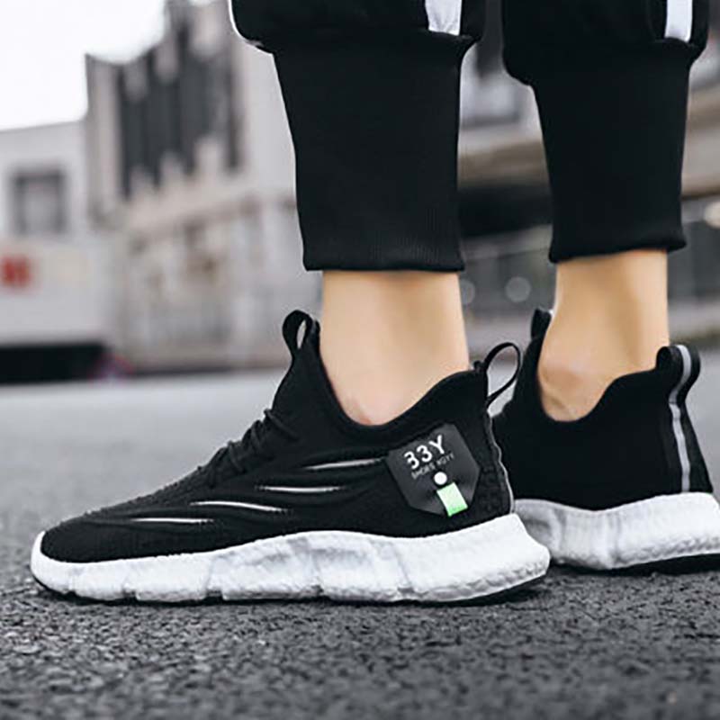 Comfortable and Breathable Men's Sports Shoes Summer Trend Casual Shoes Running Shoes Mesh Flying Shoes