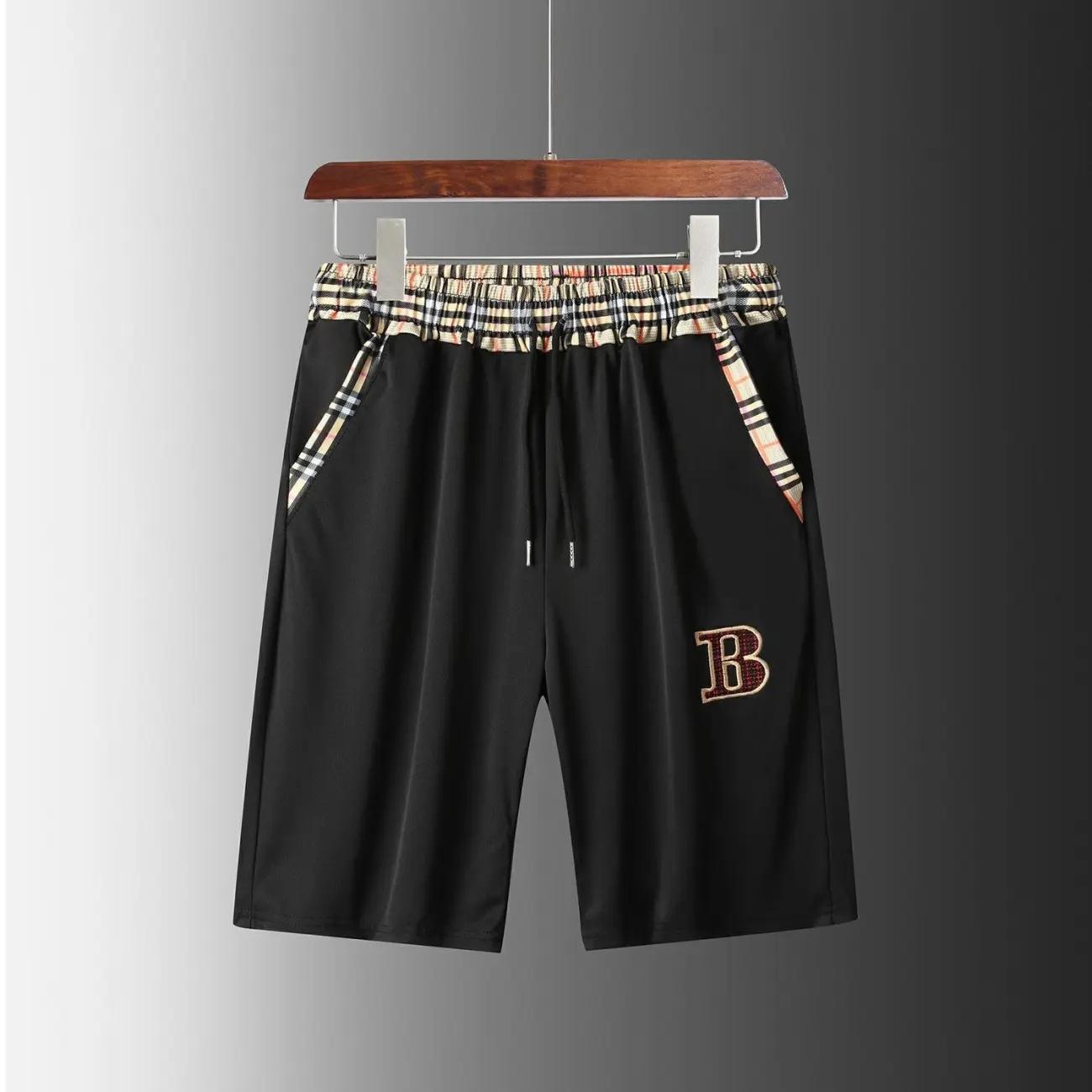 Sports Suit Men's Summer Trend Striped Plaid Stitching Summer Men's Casual Short-sleeved Five-point Pants Two-piece Set