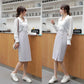 Irregular Chiffon Hip Skirt Beaded Button Women's Spring and Summer New High Waist Mid-length Skirt Split Black Professional Office Skirt
