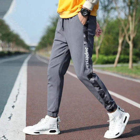 Men's Casual Trousers Spring and Autumn Thin Section Loose Sports Harem Pants Elastic Nine Strappy Overalls Trousers