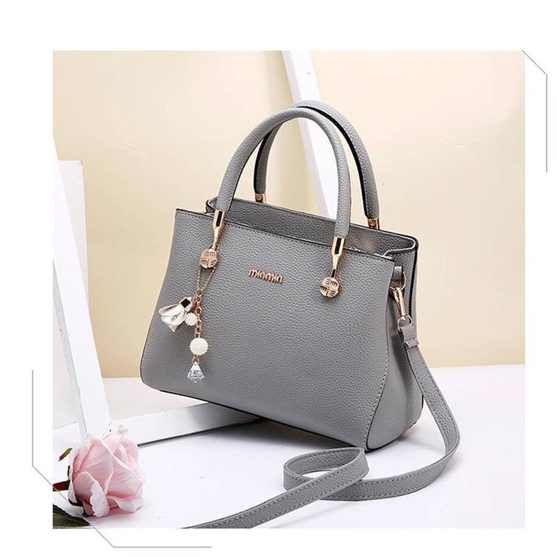 Women's top-handle bag  leather handbag zipper shoulder bags With metal pendants and free wallet