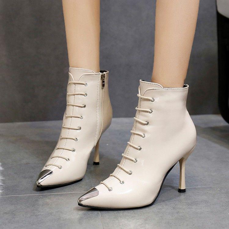 Female Autumn and Winter High Heels PU Upper Metal Decoration Pure Color Stiletto Pointed Toe Boots
