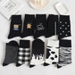Four Pairs of Women's Cotton Cartoon Socks, Black Cow Pattern Print Socks
