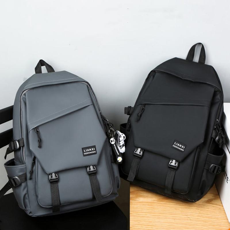 Male College Students Fashion Trend School Bag Campus Backpack Men's Shoulder Bag Korean Version of Simple Female Wild Travel Computer Bag