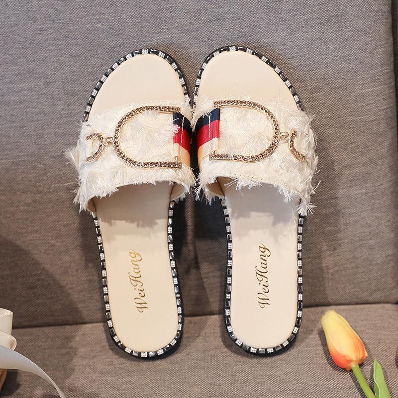 Summer sandals and slippers female Xia Ms. flat bottom hairy slippers wear fashion word drag female